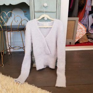 Pink Rose, Size XS fuzzy blue V neck long sleeve sweater.